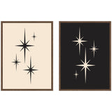 Two framed canvas wall art pieces featuring starburst atomic 70s style designs in walnut brown frames