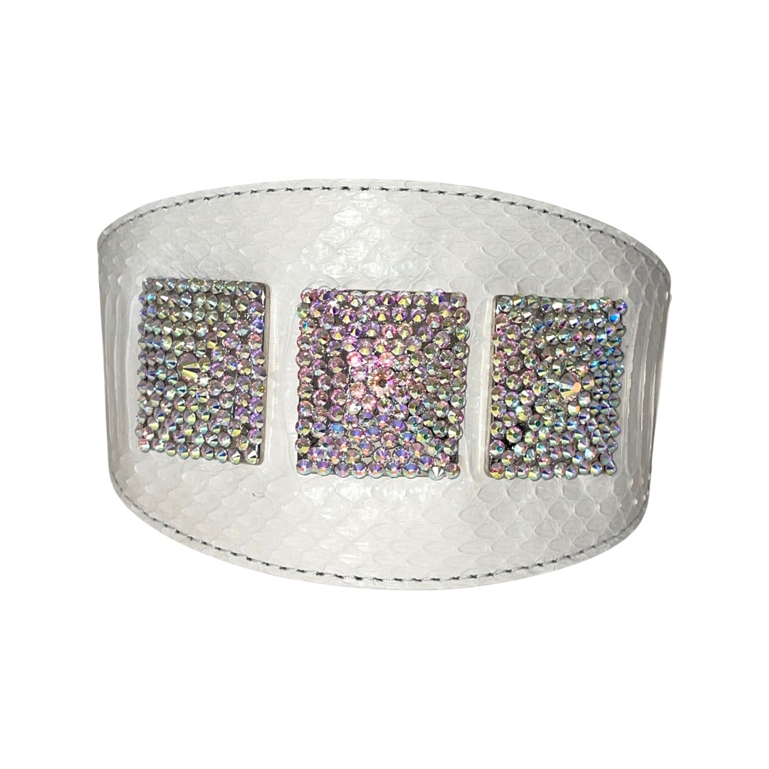 Matte white snake-patterned 4-inch wide collar featuring three rectangular custom Swarovski crystal rivets with iridescent sparkle, displayed against a white background.