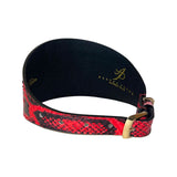 Curved dog collar with red and black snake pattern on the outer side and black inner lining with gold logo, featuring a gold buckle clasp.