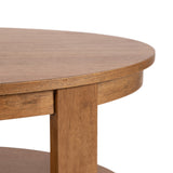 Close-up of an oval wooden coffee table's smooth edge and sturdy leg with warm, natural wood grain visible.
