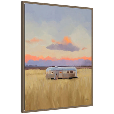 Framed canvas wall art titled 'Solitude' in dark gold tones by Mary Sparrow, placed above a mid-century modern credenza with plants.