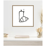 Minimalist black ink illustration of a steaming coffee cup and a croissant on white canvas framed in wood, hanging above a shelf with dried flowers and books.