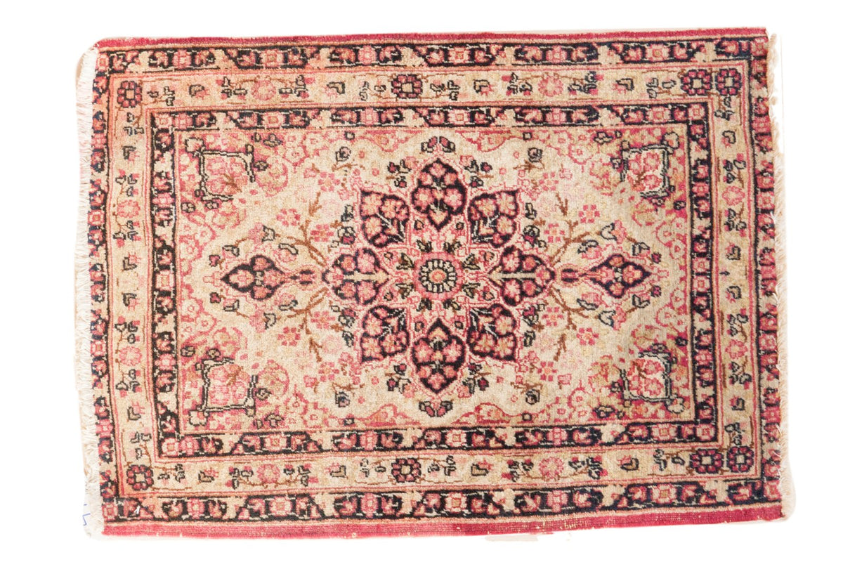 2x3 Antique Kerman Rug Mat showing starburst medallion with floral patterns in antique and red tones