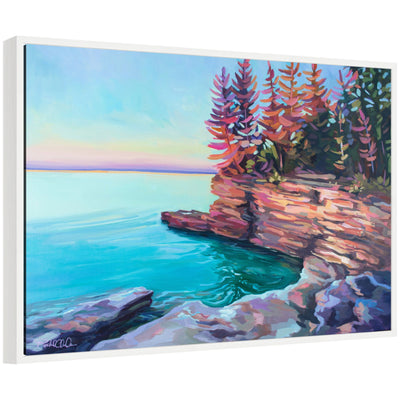 Framed canvas art of a serene landscape titled Cave Point at Sunrise by Rachel Christopoulos