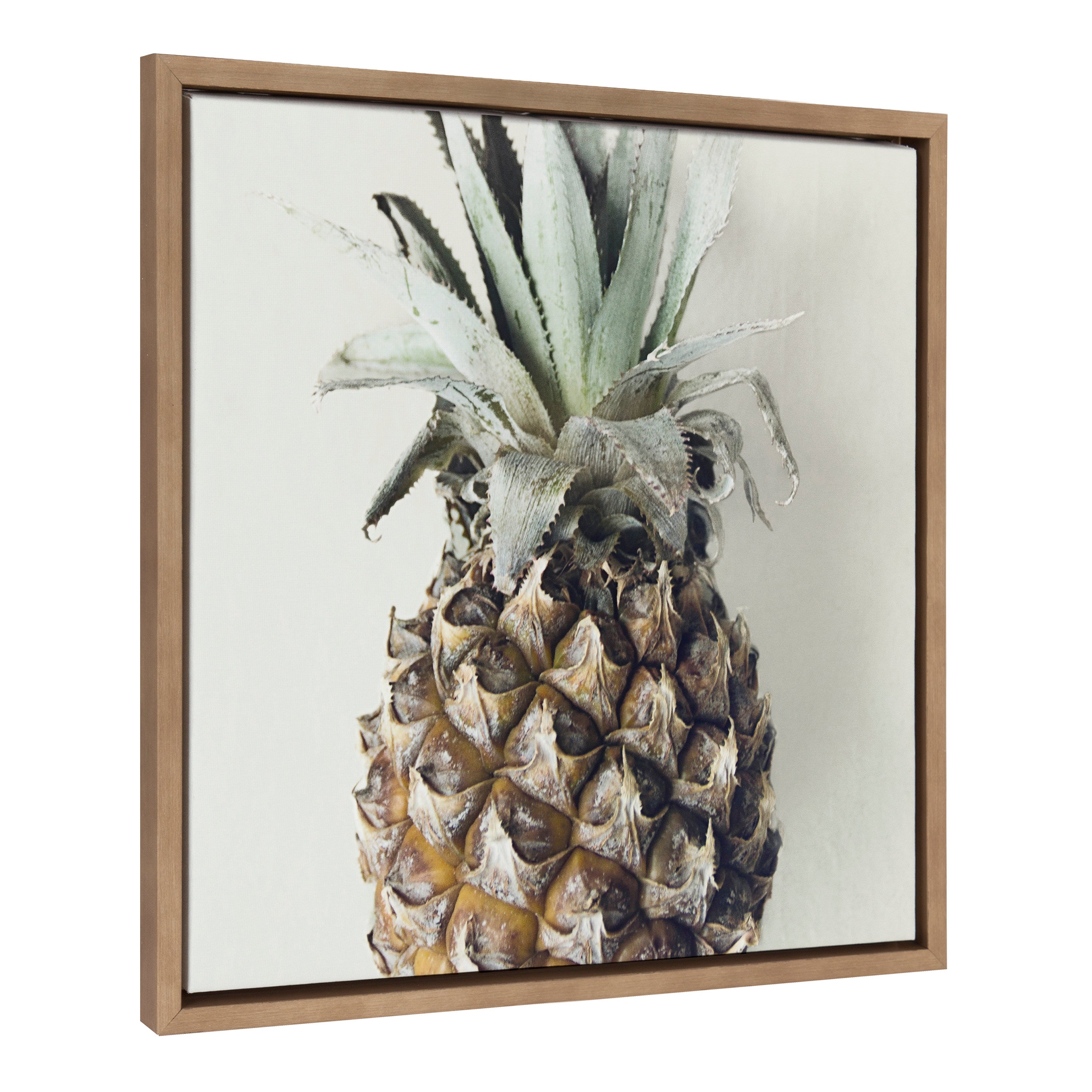 Sylvie Solo Pineapple framed canvas art showing a vibrant pineapple still life with a white float-style frame