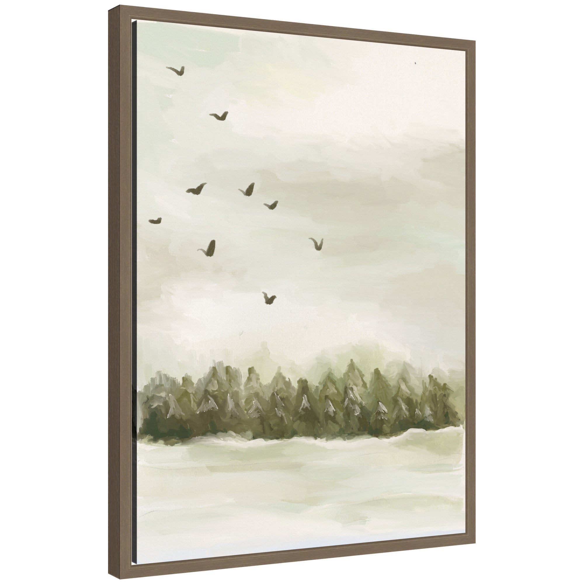 Framed canvas art depicting a winter landscape with evergreen trees and birds flying under a pale sky