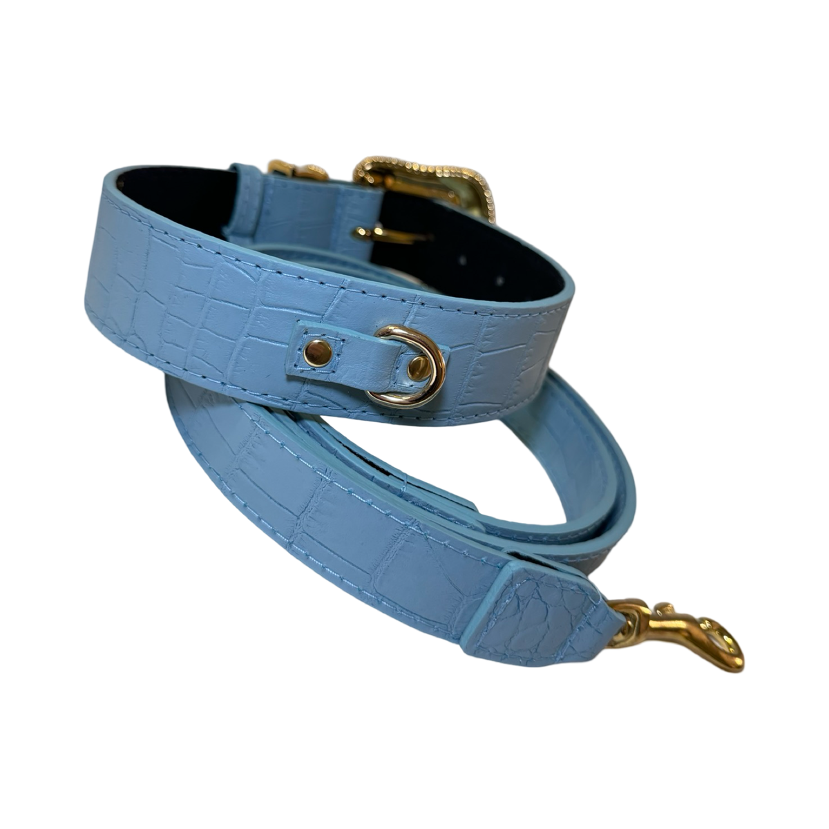 Light blue faux crocodile textured dog collar and matching leash with gold hardware, shown coiled against a white background.