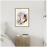 Abstract framed canvas with broad blue, black, and rust brushstrokes accented by thin gold lines, hanging above a rustic wooden nightstand in a minimalist white bedroom.