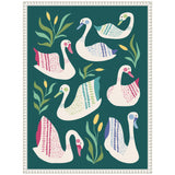 Stylized illustration of seven white swans decorated with colorful feather patterns in pink, blue, and green, surrounded by green reeds with yellow tips on a dark teal background.
