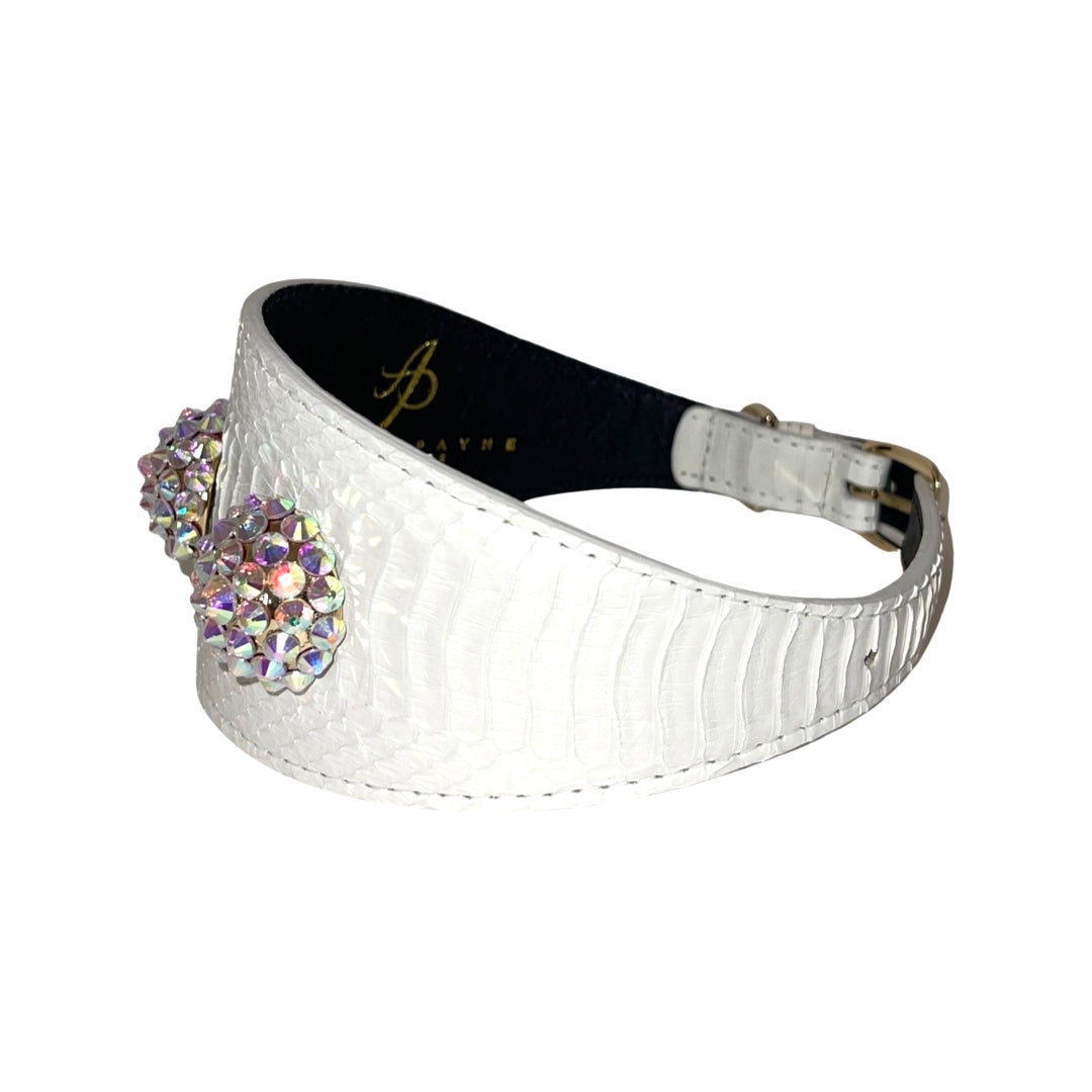 Wide matte white collar with textured pattern, adorned with two large clusters of iridescent Swarovski crystals and a gold buckle closure.