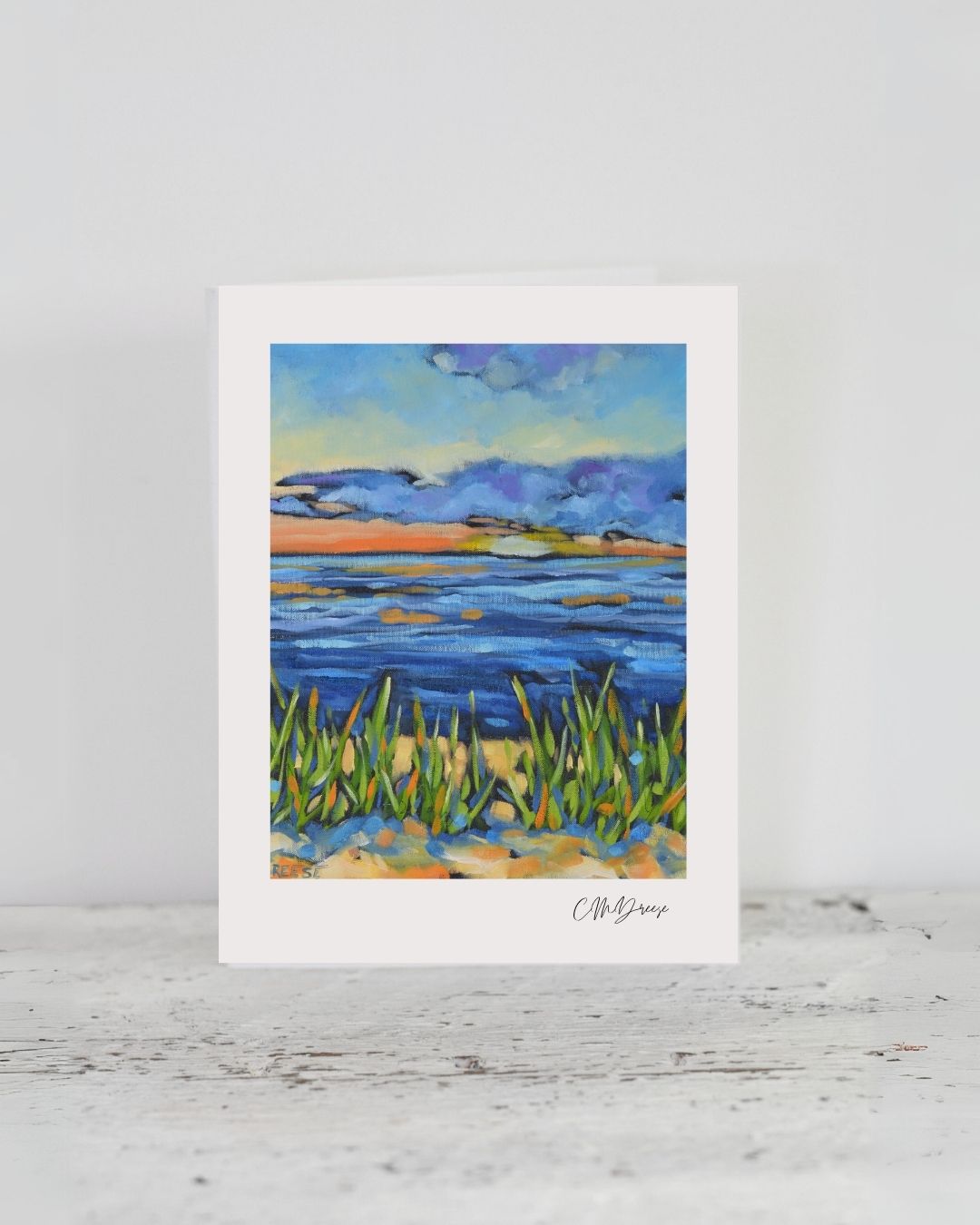 Notecard - Reset at Sunset showing texture and envelope on a white surface