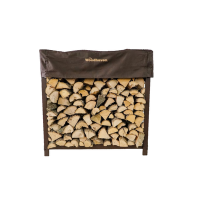 Woodhaven 3 ft Firewood Rack with seasoning cover in black finish holding stacked firewood