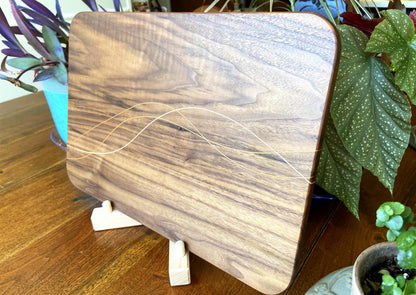 Walnut charcuterie board with Cherry and Maple decorative banding by Fitzgerald Custom Woodcraft