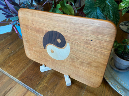 Cherry wood charcuterie board with Yin Yang inlay made from Peruvian walnut and maple