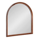Arched wall mirror with a smooth, medium-brown wooden frame featuring rounded edges and a flat base.