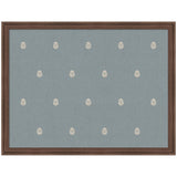 Rectangular pinboard with muted blue fabric featuring evenly spaced small white botanical block prints, framed in dark wood.
