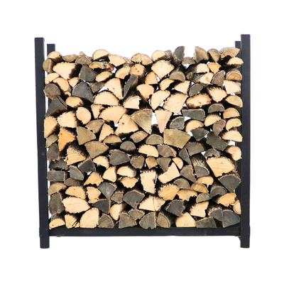 Woodhaven 4 ft Firewood Rack holding stacked firewood outdoors