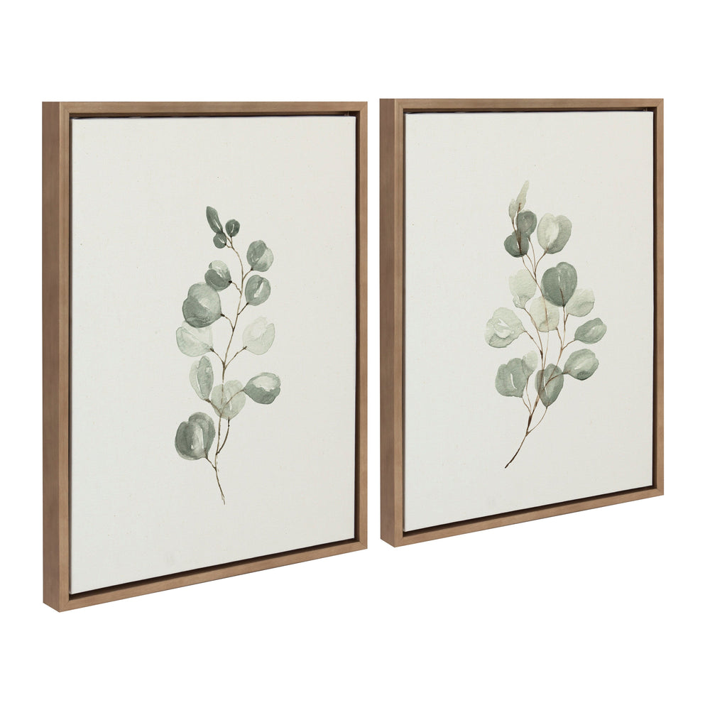 Sylvie Eucalyptus Framed Canvas Set by Maja Mitrovic showing two eucalyptus prints in gold frames against a neutral wall.