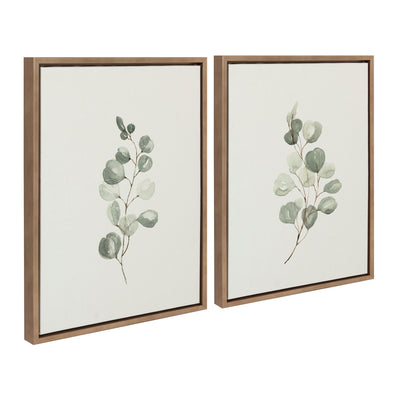 Sylvie Eucalyptus Framed Canvas Set by Maja Mitrovic showing two eucalyptus prints in gold frames against a neutral wall.