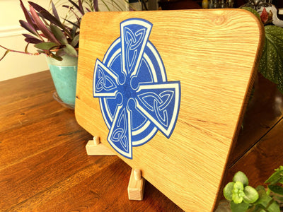 Handmade Celtic Cross charcuterie board in white oak with white on blue resin inlay