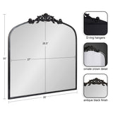 Rectangular mirror with an antique black finish and ornate crown detail at the top center, measuring 30 by 28 inches, showing D-ring hangers on the back.