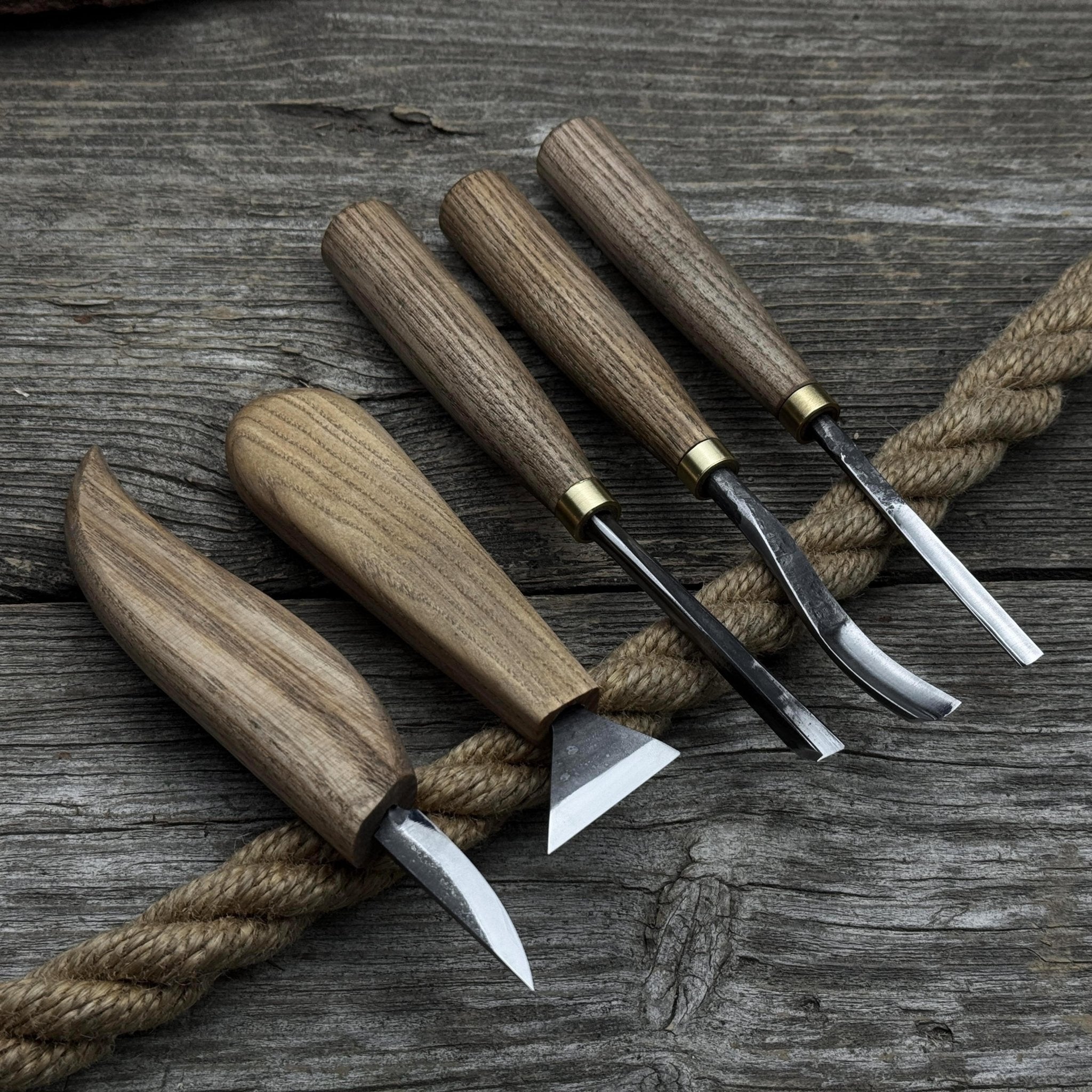 5-piece wood carving tool set including carving knives, chisels, and gouges with wooden handles