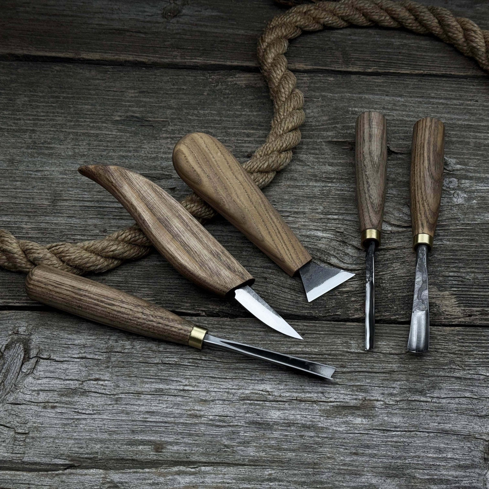 5-piece wood carving tool set including carving knives, chisels, and gouges with wooden handles