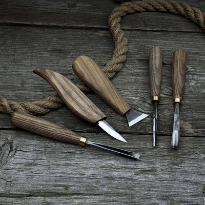 5-piece wood carving tool set including carving knives, chisels, and gouges with wooden handles