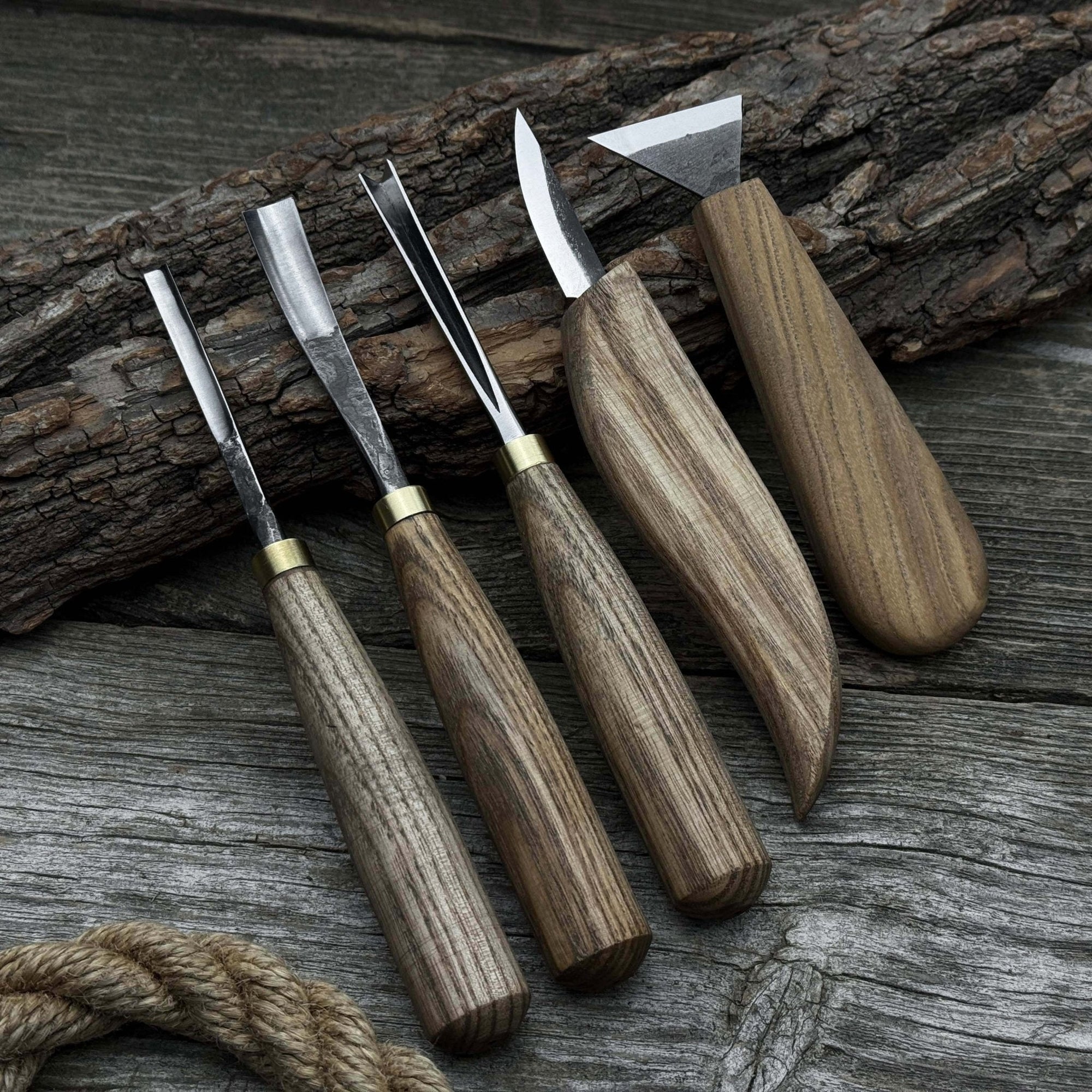 5-piece wood carving tool set including carving knives, chisels, and gouges with wooden handles