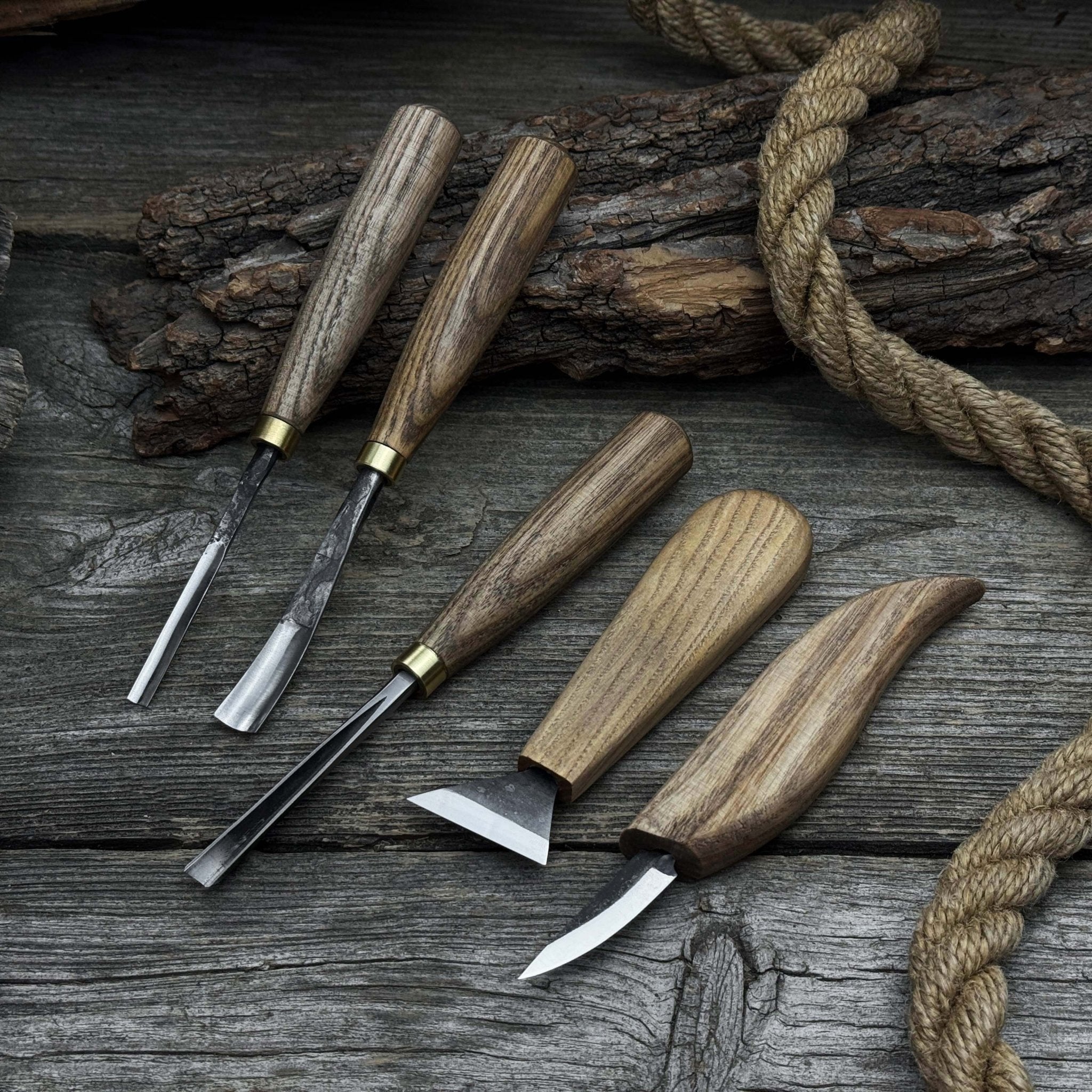 5-piece wood carving tool set including carving knives, chisels, and gouges with wooden handles