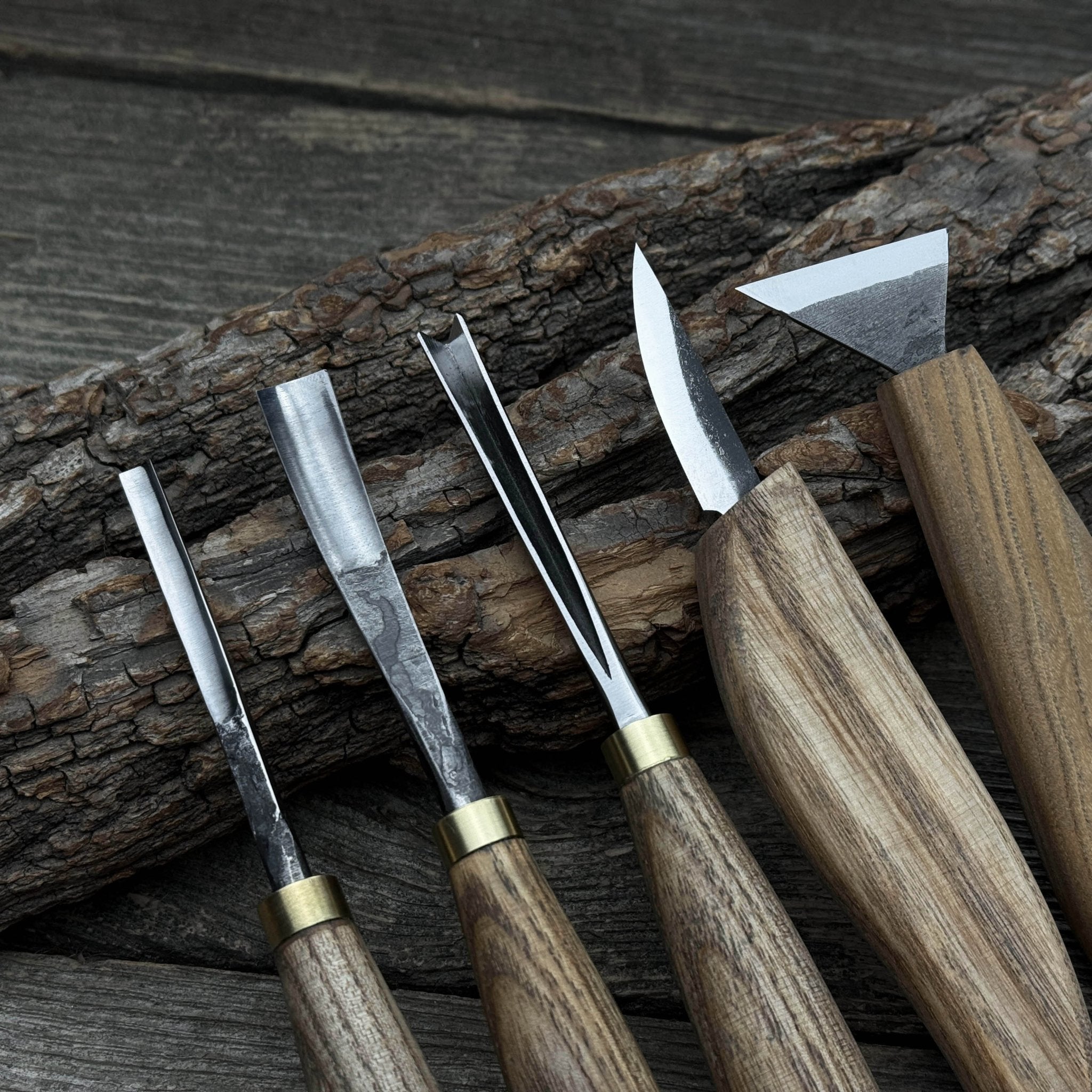 5-piece wood carving tool set including carving knives, chisels, and gouges with wooden handles