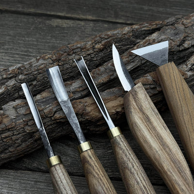 5-piece wood carving tool set including carving knives, chisels, and gouges with wooden handles