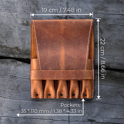 5-pocket leather tool case made from Crazy Horse leather with five tool pockets and leather strap closure