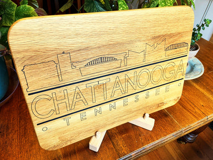 Handmade white oak charcuterie board with engraved Chattanooga skyline