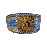Blue and gold textured band resembling snake skin with an ornate gold lion head centerpiece featuring a heart shape and intricate details