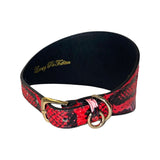 Red and black snake-patterned 4-inch wide collar with fuchsia and light pink accents, featuring a gold buckle and D-ring on black lining.