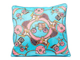Cushion Carrialle 45x45cm shown on a sofa displaying soft velvet-look polyester texture and subtle color.