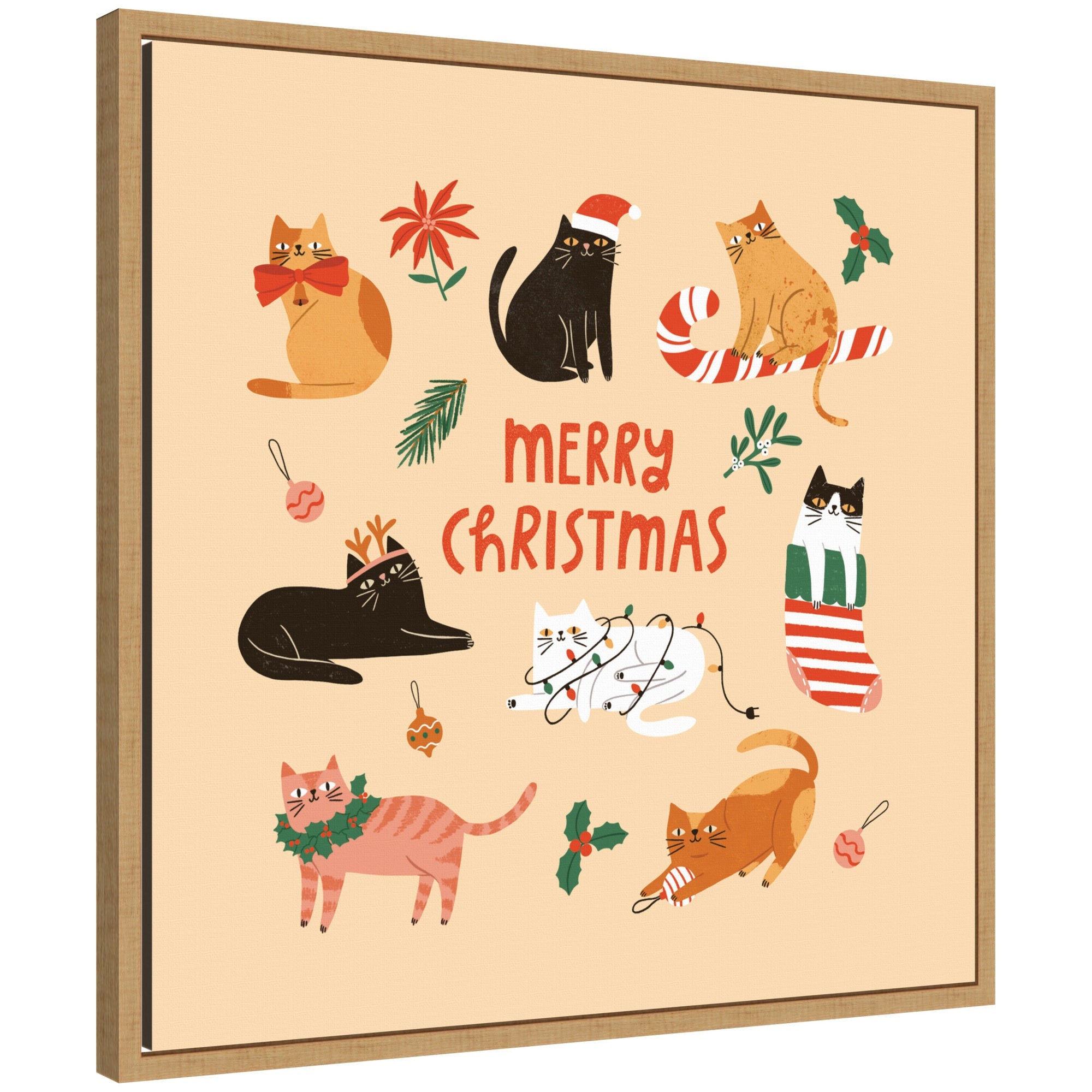 Framed canvas art showing whimsical cats in Christmas attire with "Merry Christmas" text