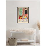 Framed 1947 Henri Matisse print showing colorful abstract table scene with fruit plate, greenery outside window, and handwritten French text on beige wall.