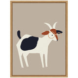 Simplified stylized goat with black and brown patches, curved horns, and round glasses on a muted beige background in a wooden frame.