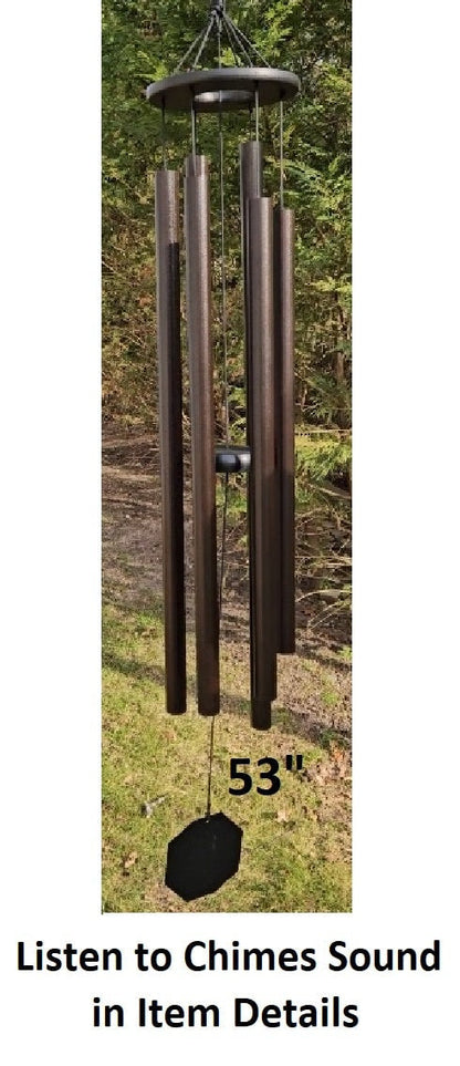 Amish handmade aluminum wind chimes in various sizes hanging outdoors