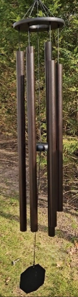 Amish handmade aluminum wind chimes in various sizes hanging outdoors