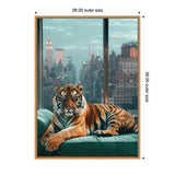 Realistic tiger resting on a teal sofa in front of a large window with a New York City skyline at dusk, framed with a simple light wood border.