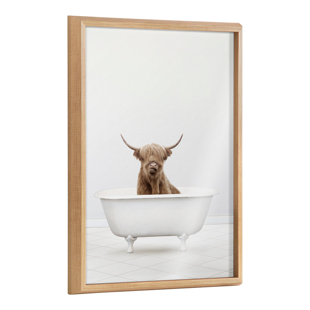Framed printed glass art showing baby Highland cow sitting in a bathtub, by Amy Peterson Art Studio