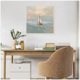 Pastel painting of a sailboat on calm sea with soft blue and beige tones, displayed above a wooden desk with a beige upholstered chair.