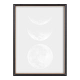 Framed artwork with three white moon phases vertically aligned on a light gray background within a simple dark brown frame.