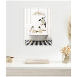 Three penguins in and around a vintage clawfoot bathtub filled with bubbles, set against a black-and-white checkered floor and white paneled wall, with a modern brass chandelier above.