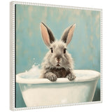Framed canvas print showing a white bunny in a bathtub with vintage beaded frame