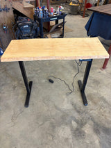 Adjustable height sit/stand pecan desk with wooden finish and metal legs
