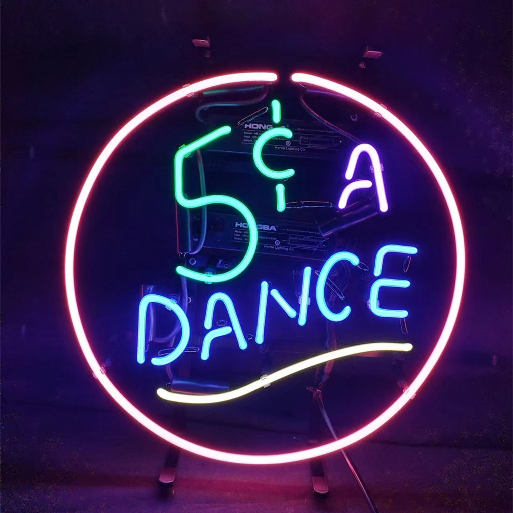 Circular neon sign with a red outer ring, green and white '5¢ A' text, blue 'DANCE' text, and yellow curved line beneath, on a dark background.